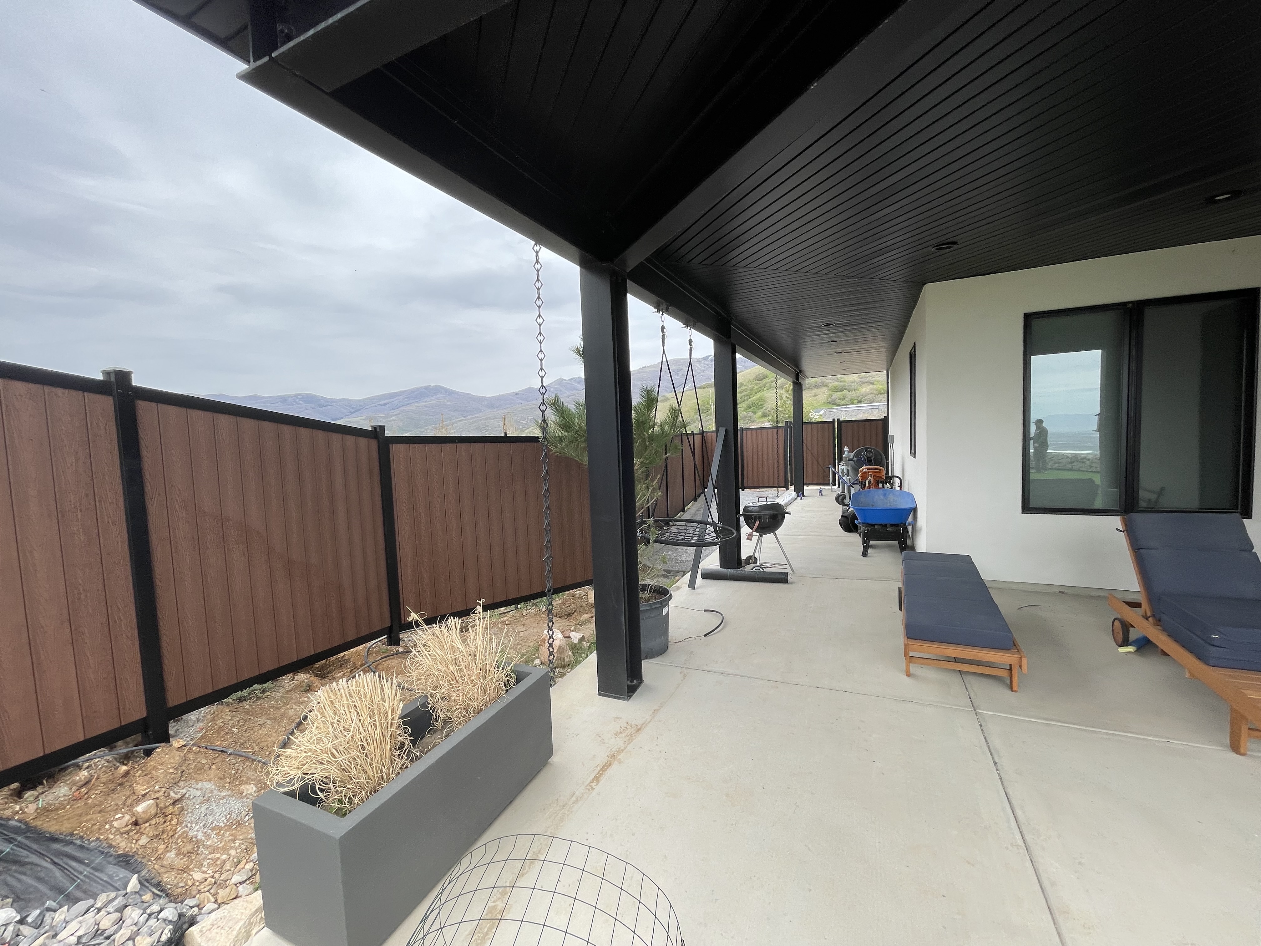 Black Avimore Aluminum with Composite Brown Wood Grain Fill installed by Spacemakers Fence in Bountiful, Utah